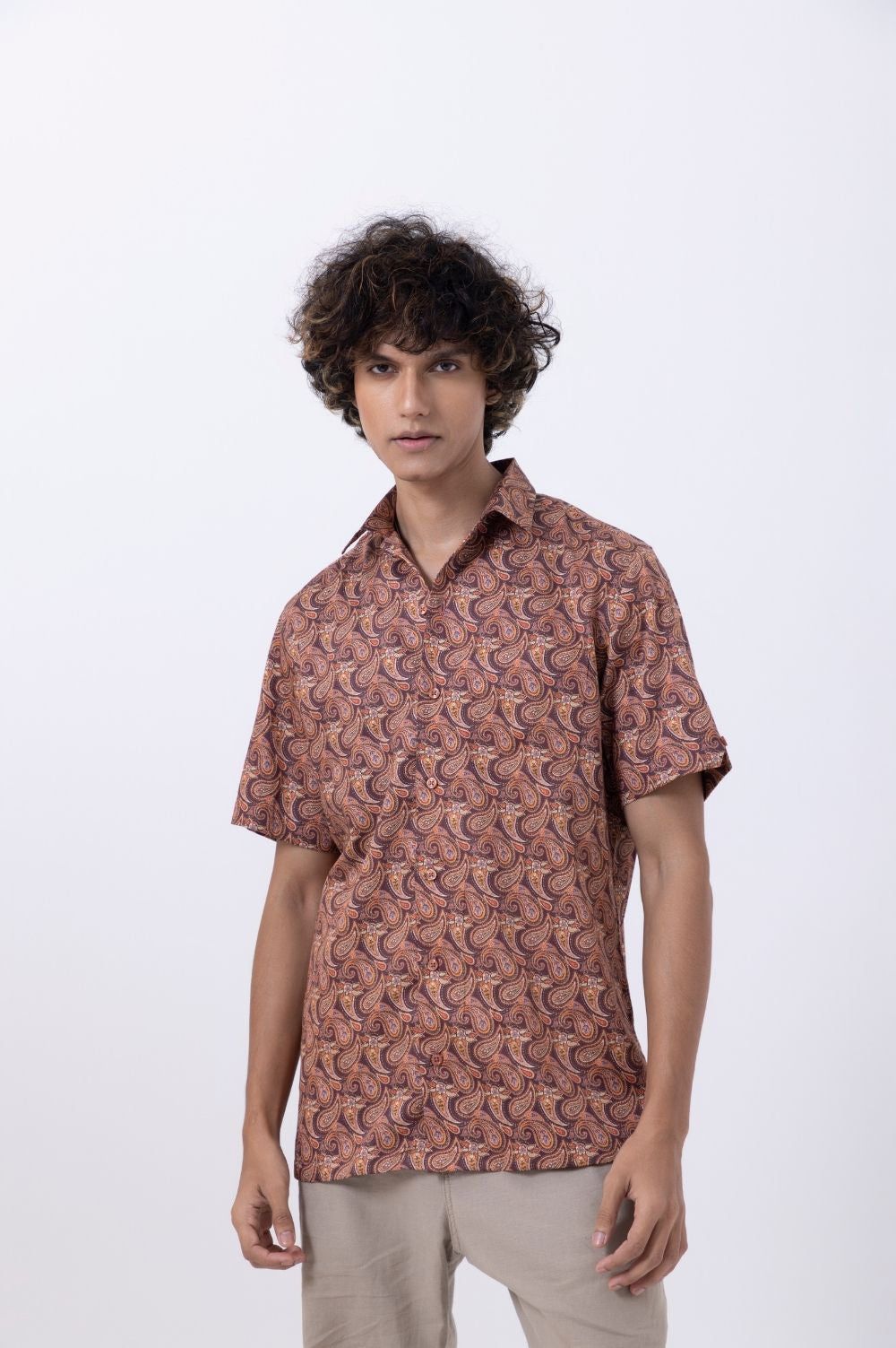 Men's Abstract Print Slim Fit Shirt in rich rust color, showcasing a modern design and comfortable fit.