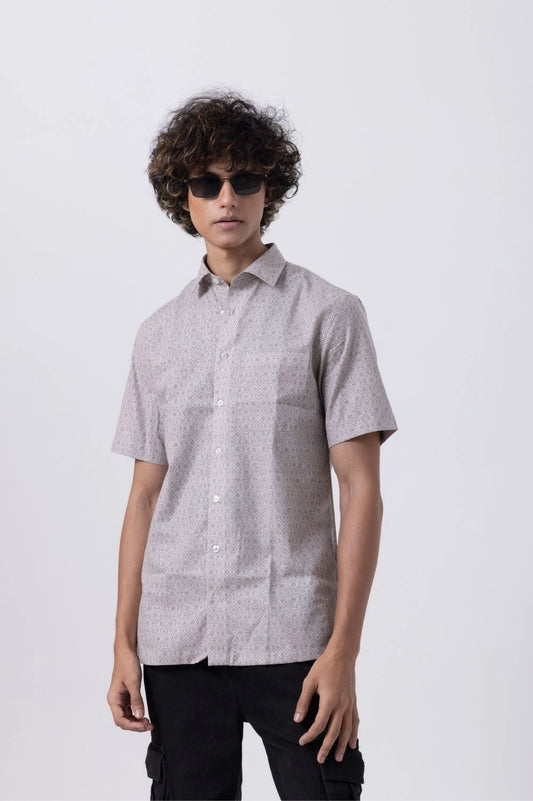 Men's printed half sleeve shirt in melange, showcasing slim fit style for formal and casual wear.