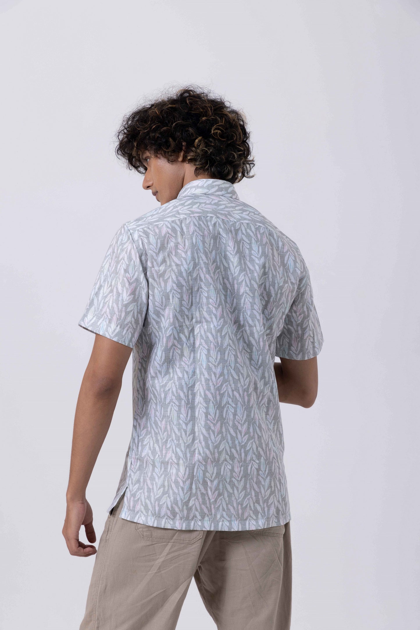 Leaf print down collar slim fit shirt shown from the back, featuring a modern design and soft melange fabric.