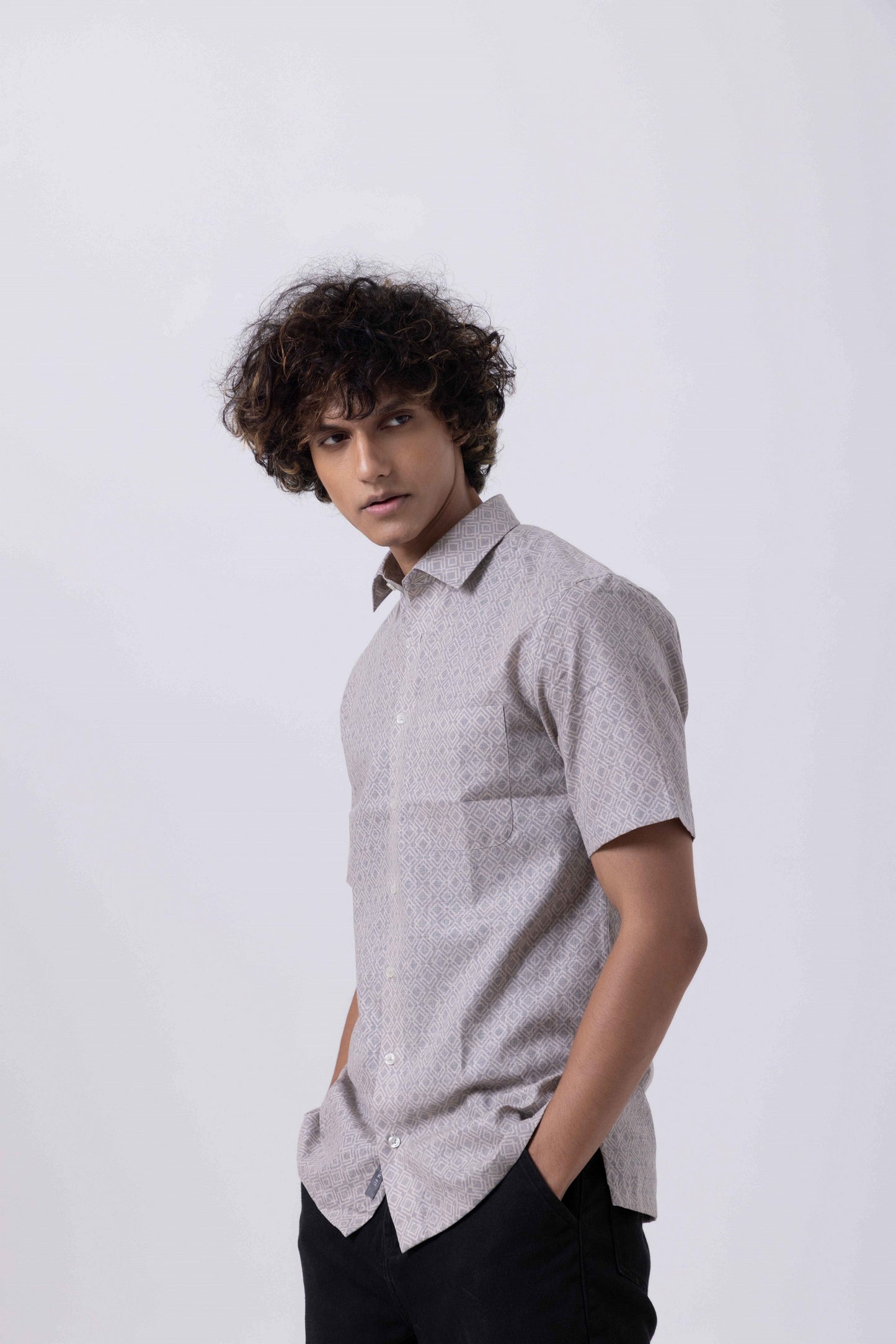 Men's printed half sleeve shirt in melange with block print style, ideal for formal and smart casual occasions.