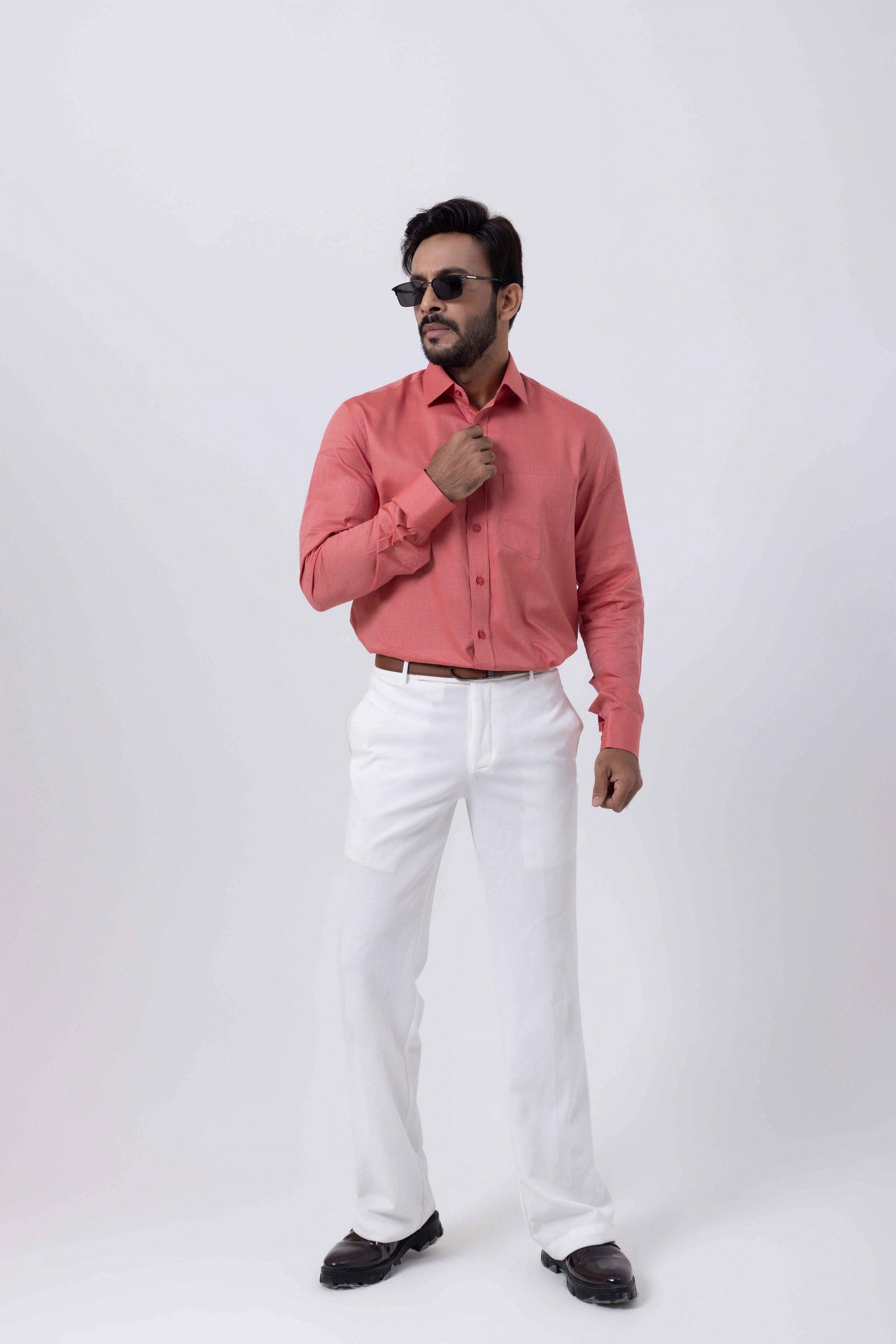Men's Premium Giza Cotton red shirt styled with white pants, exuding sophistication and elegance.