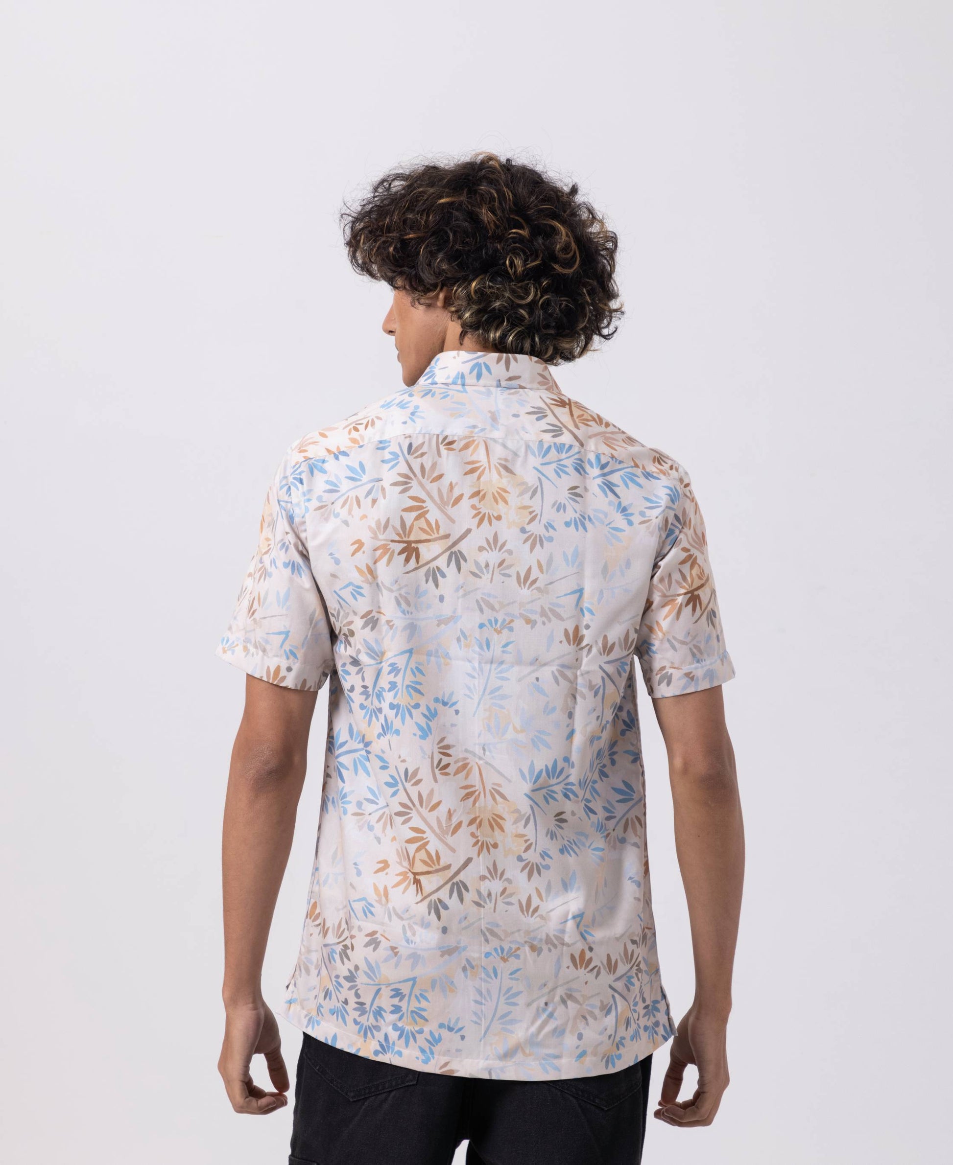 Back view of Leaf Printed Satin Slim Fit Shirt for men, showcasing its elegant floral design and modern fit.