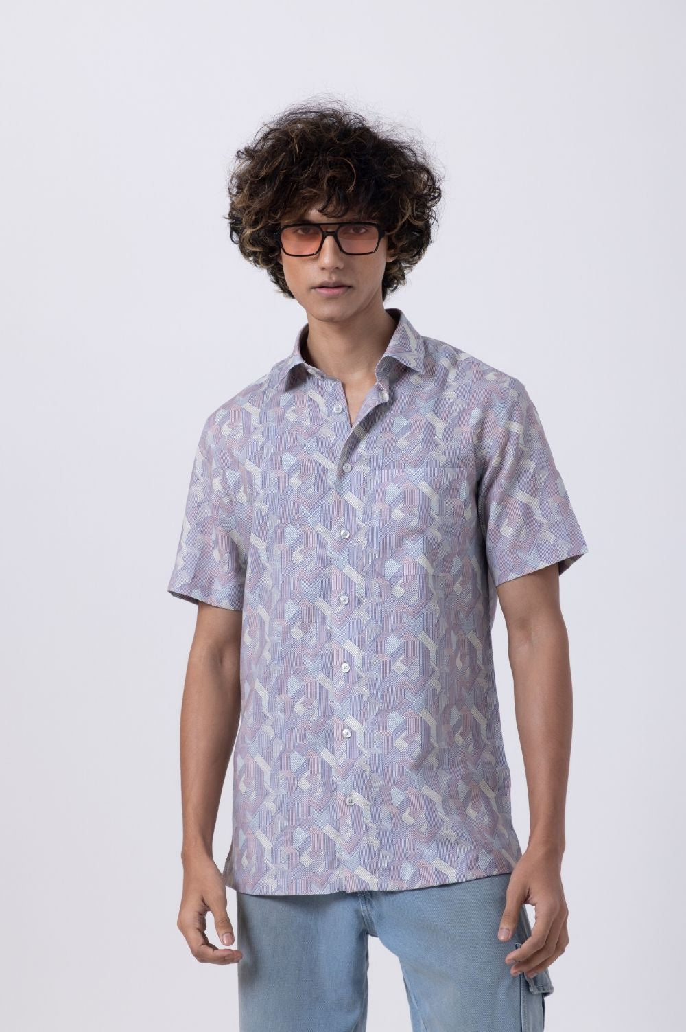 Men's fashion featuring a blue abstract print slim fit half sleeve shirt from TAILORS COVE.