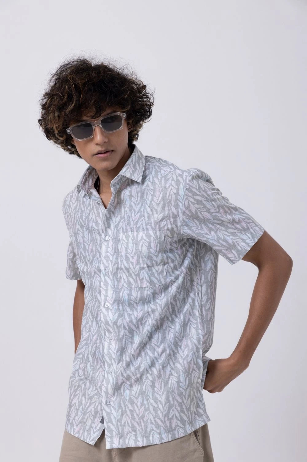 Model wearing Leaf Print Down Collar Slim Fit Shirt in Melange, showcasing a modern, nature-inspired design.