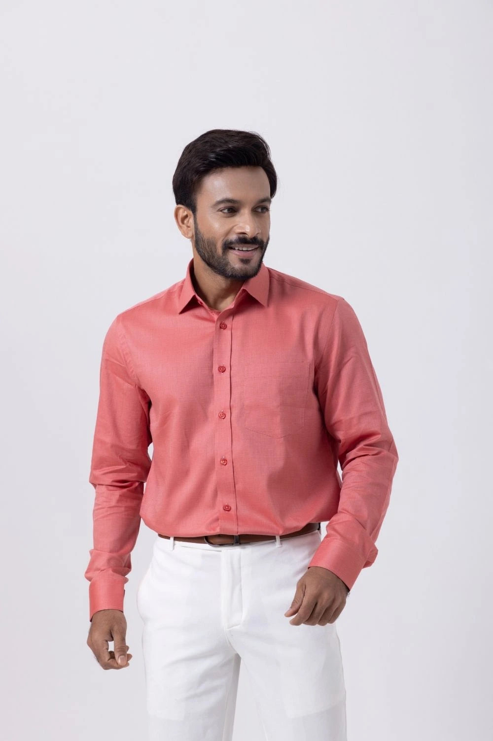 Men's Premium Giza Cotton Red Shirt with full sleeves, stylishly paired with white trousers, exuding elegance.