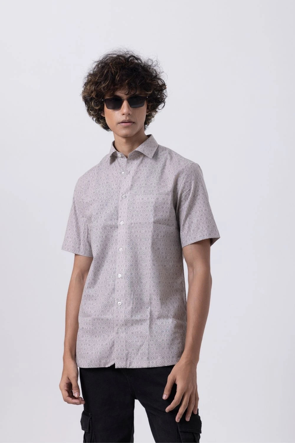 Men's printed half sleeve shirt in melange, showcasing slim fit style for formal and casual wear.