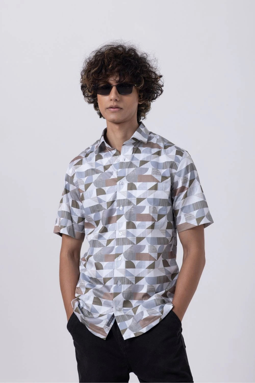The Man Printed Slim Fit Shirt by Tailors Cove featuring intricate geometric prints, ideal for casual and formal styles.