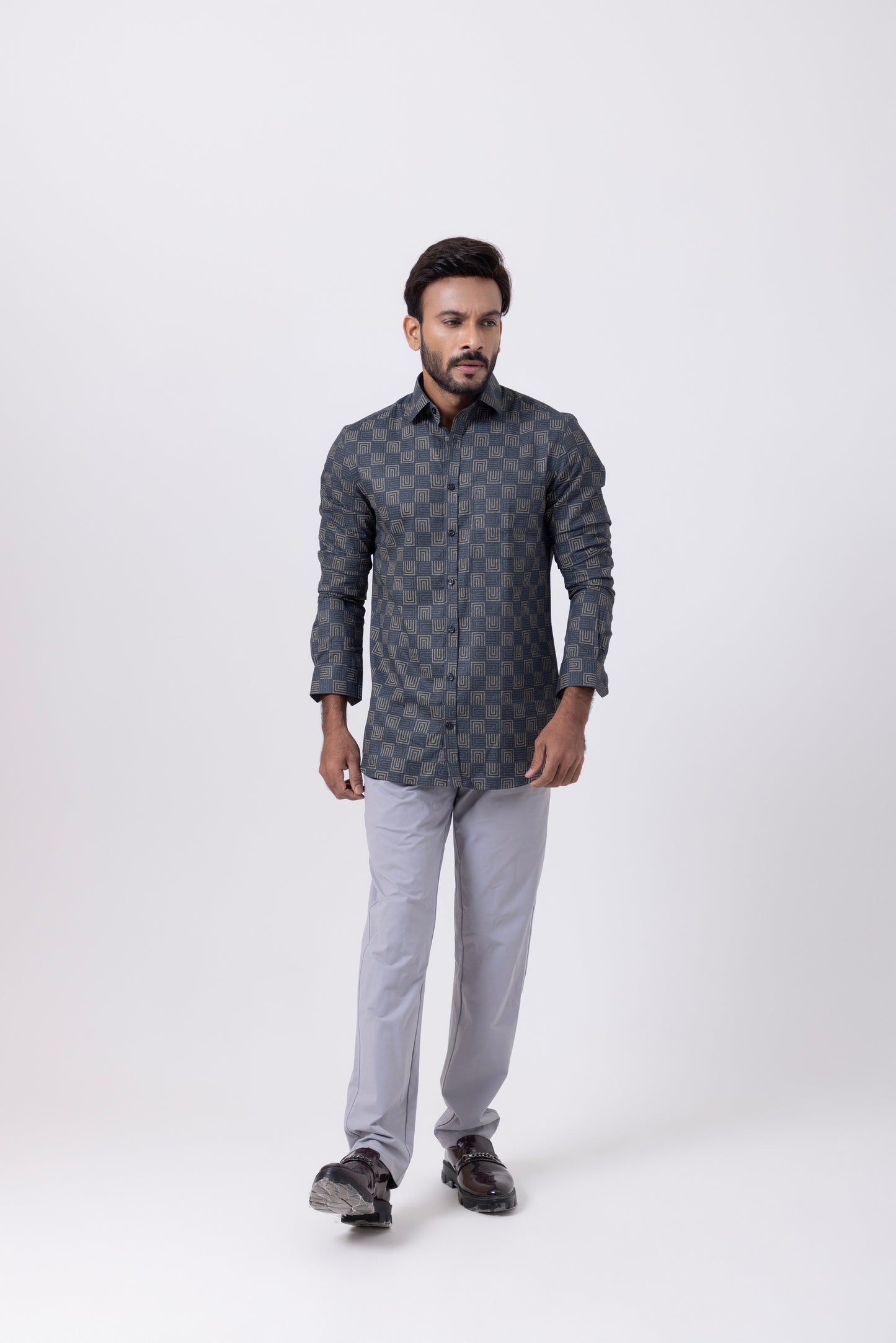 Men's premium cotton shirt with geometric satin weave pattern, tailored fit, full sleeves, and English spread collar.