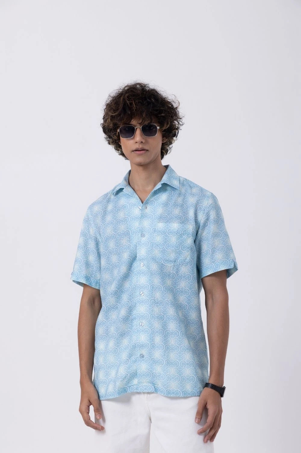 Men's vintage print open collar shirt in blue, showcasing a stylish, relaxed fit for casual and smart occasions.